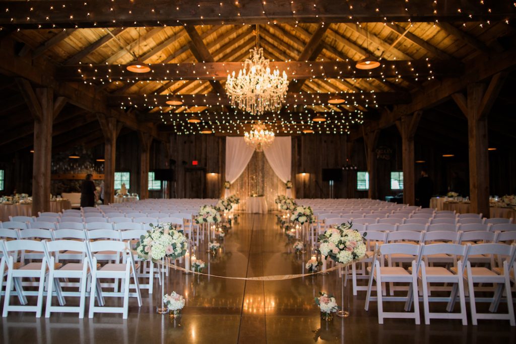 Kelley Farm Indoor Ceremony with Crystal Draping and Flowers.