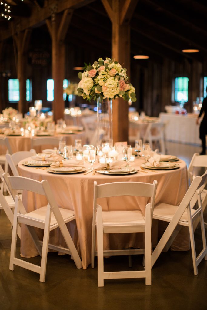 Elevated centerpiece at vintage wedding at Kelley Farm. Planning & Flowers by Jen's Blossoms