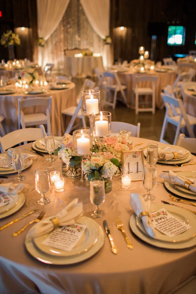 Low centerpiece at vintage Kelley Farm wedding. Planning & Flowers by Jen's Blossoms.