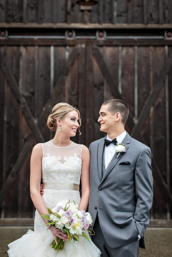 Bride and groom at Kelley Farm, Lavender and white bouquet by Jen's Blossoms