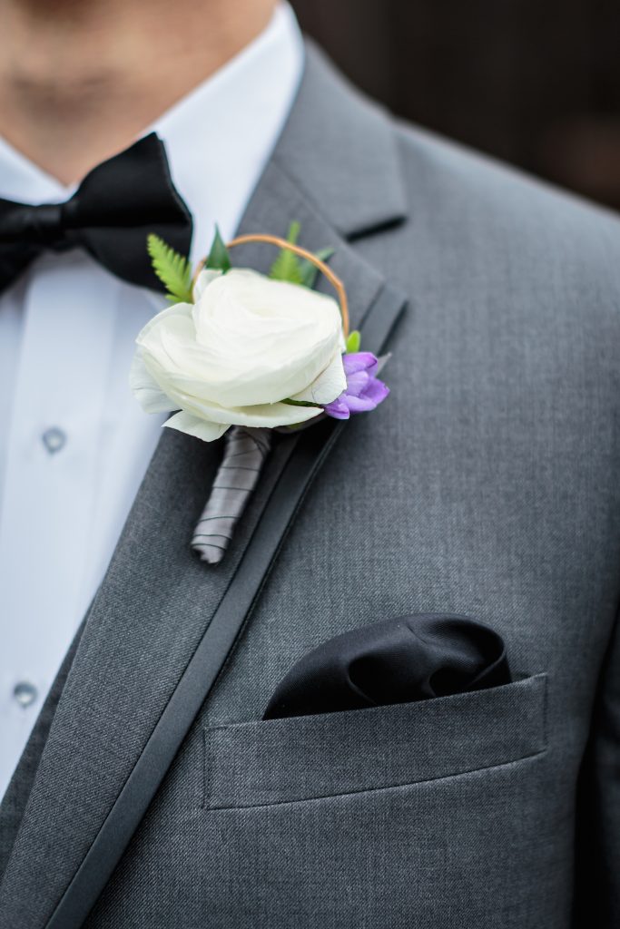 White ranunculus boutonniere by Jen's Blossoms