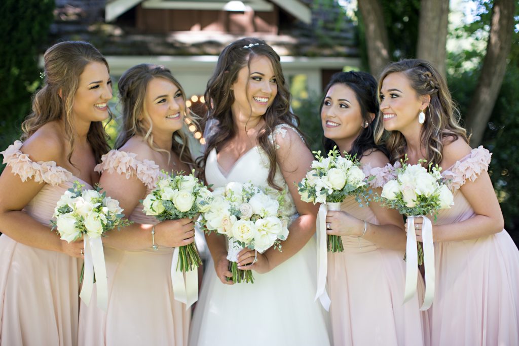 Bride & Bridesmaid bouquets by Jen's Blossoms.  Peonies & roses.