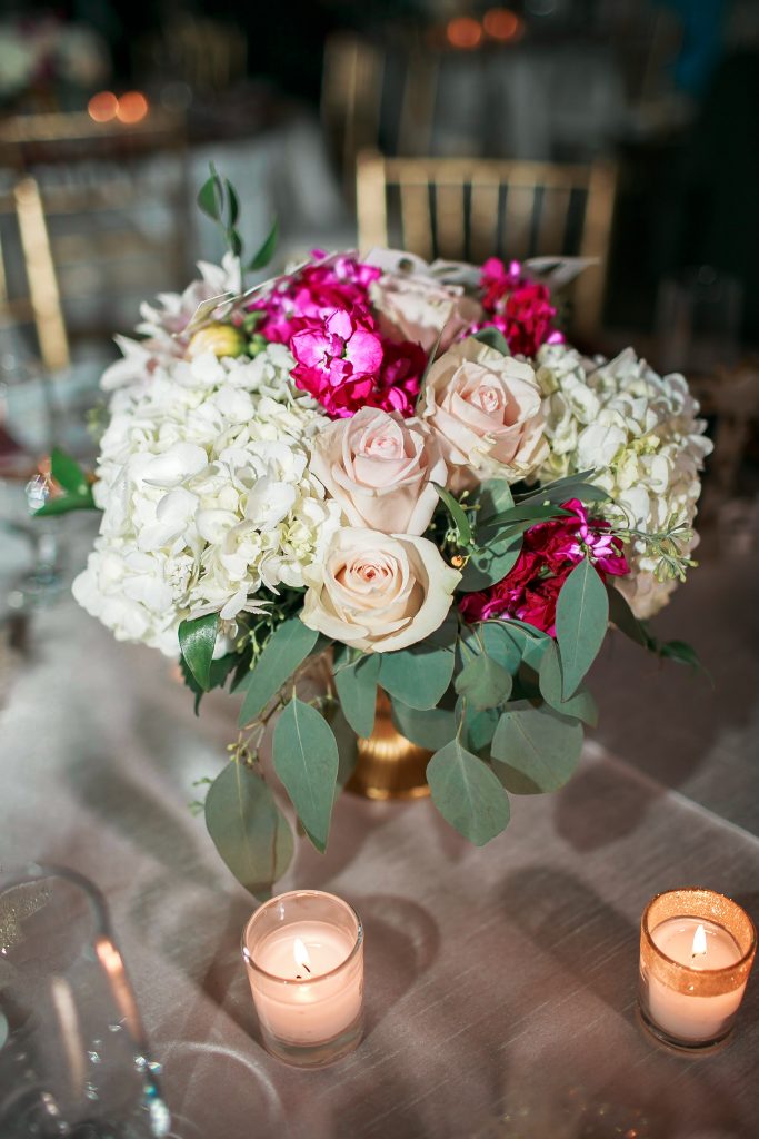 Blush, white, and fuchsia centerpiece by Jen's Blossoms at Kelley Farms 