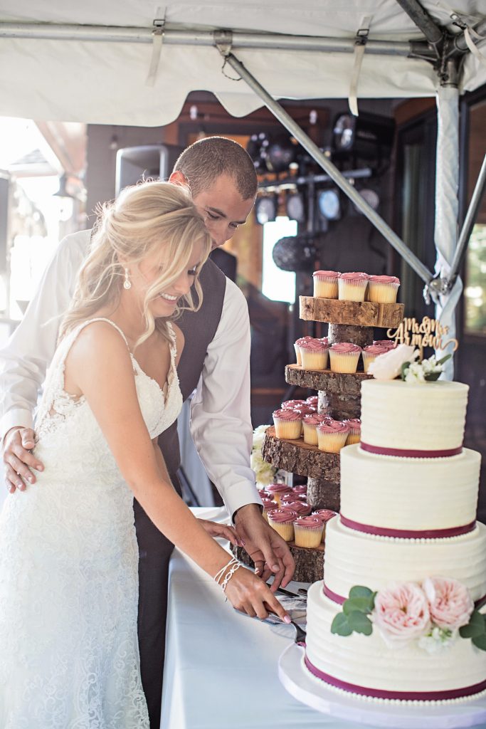 Cake cutting at Gig Harbor waterfront wedding