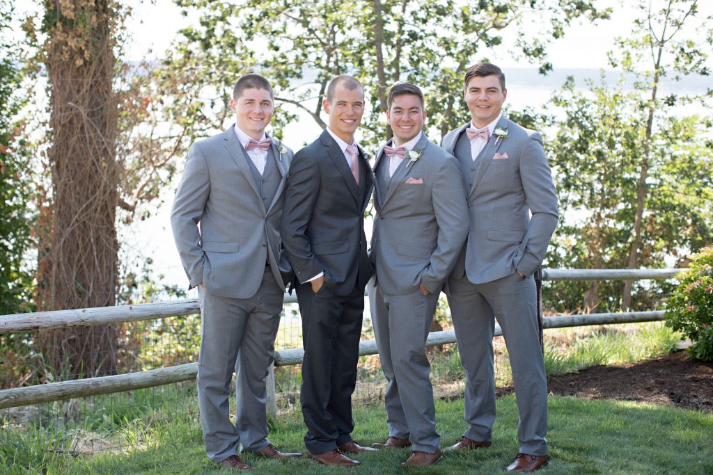 Groom with Groomsmen; ranunculus boutonnieres by Jen's Blossoms