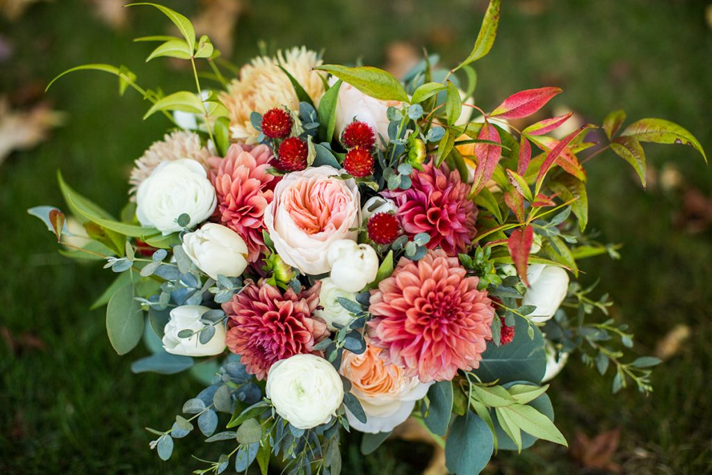 Dahlia, Garden Rose, Ranunculus, Tulips, and greenery bridal bouquet by Jen's Blossoms